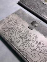 A5 notebook with multilayers of patched PU + metal tab closure