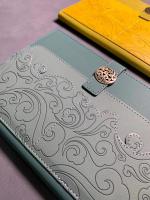 A5 notebook with multilayers of patched PU + metal tab closure