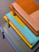 A5 notebook + detachable card holder with zipper pouch.