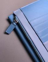 A5 notebook + detachable card holder with zipper pouch.